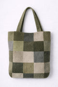 Checkered tote bag with green, gray, and beige pattern on a white background